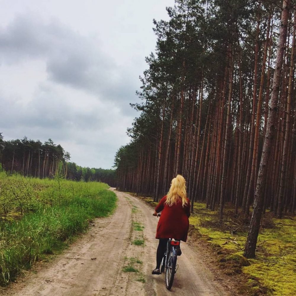 dani cycling through the countryside in poland