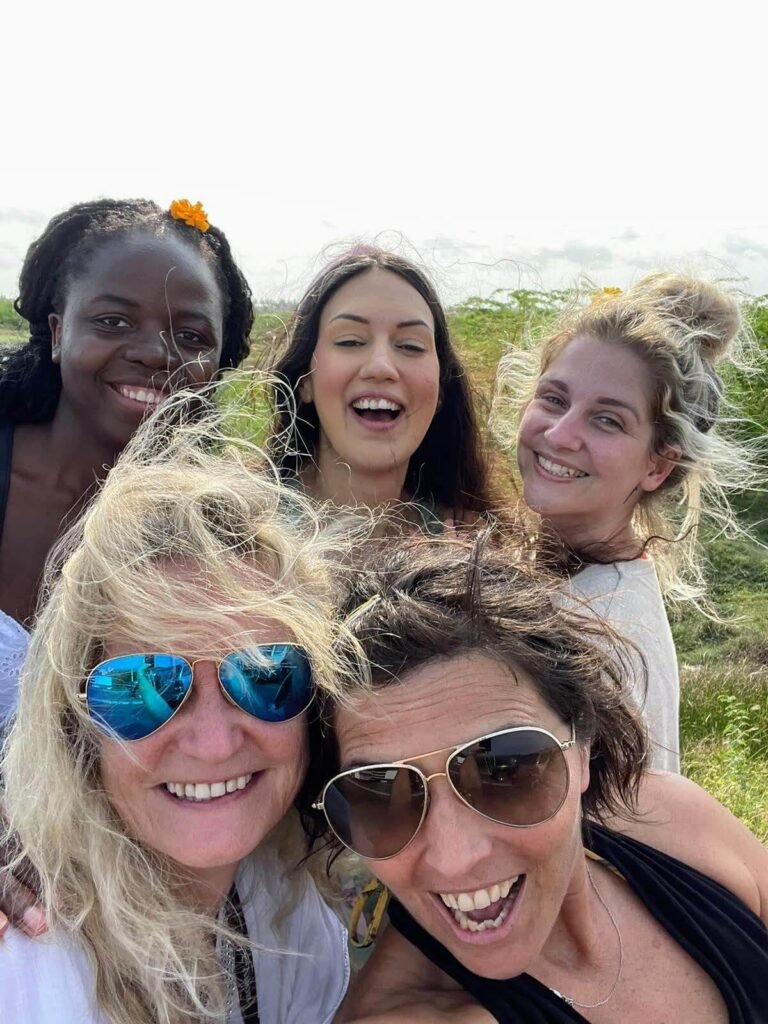 a selfie of 5 women smiling