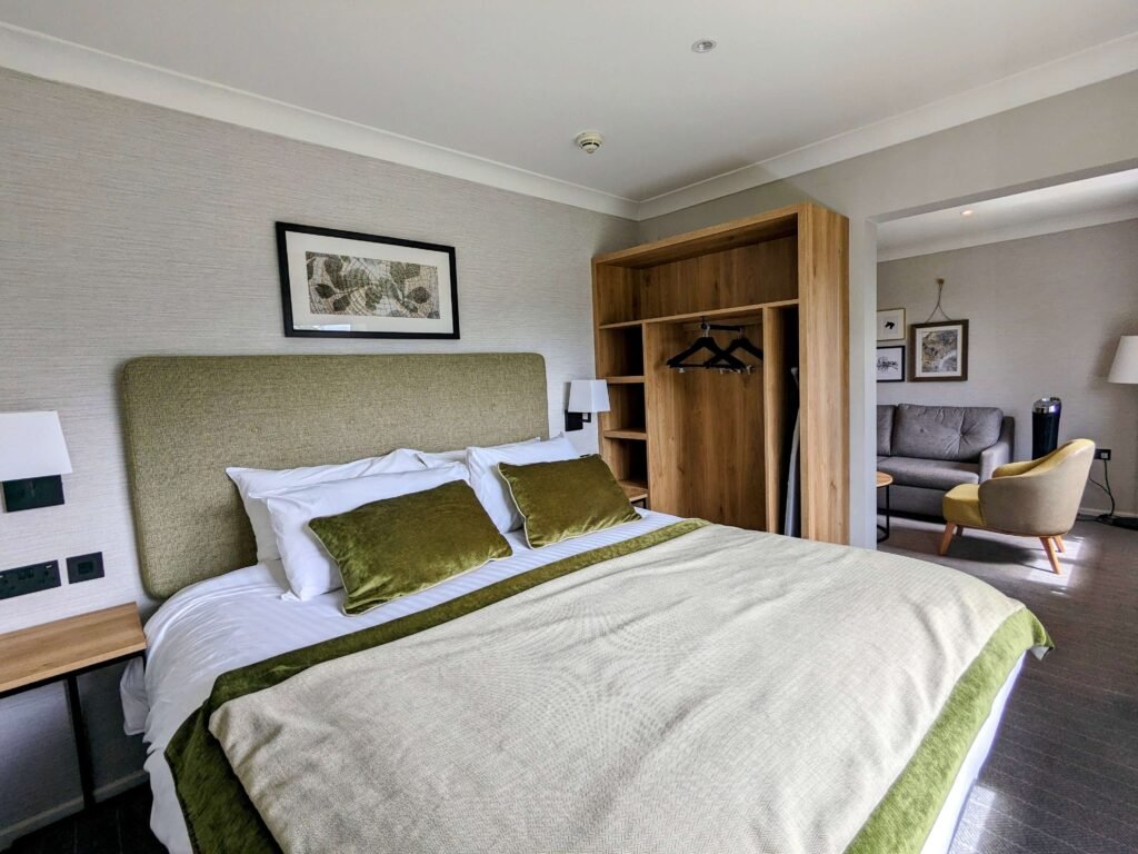 the bedroom of horwood house executive suites