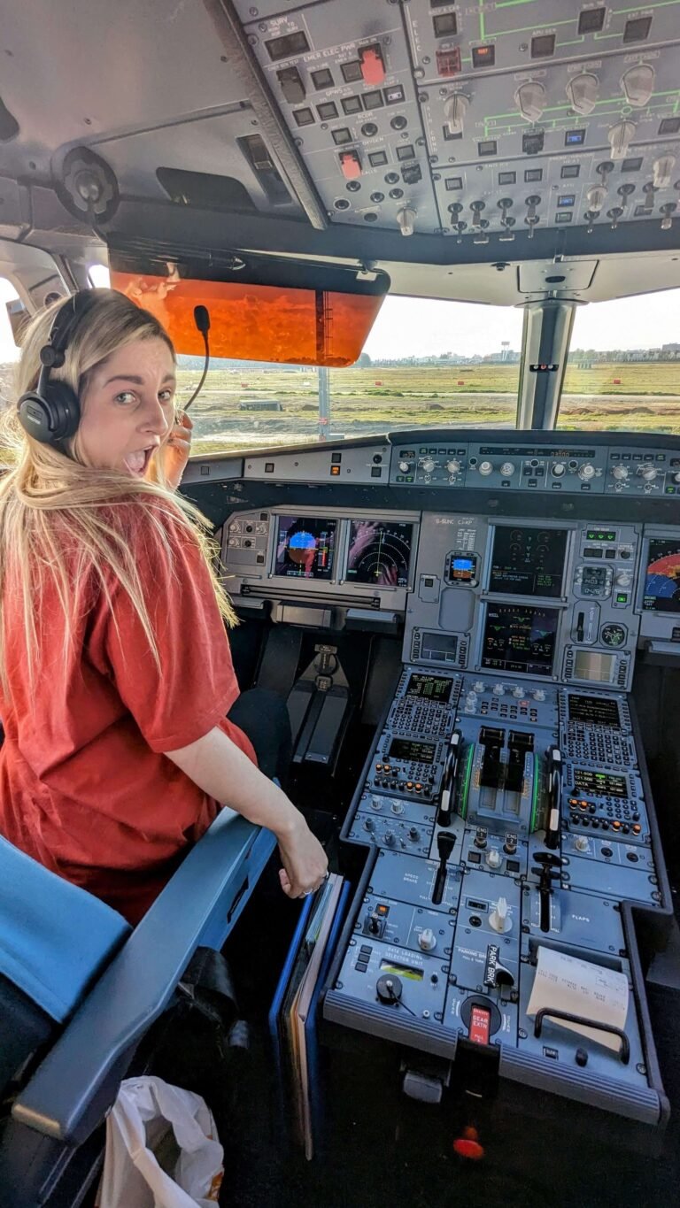 sitting in the cockpit of a plane