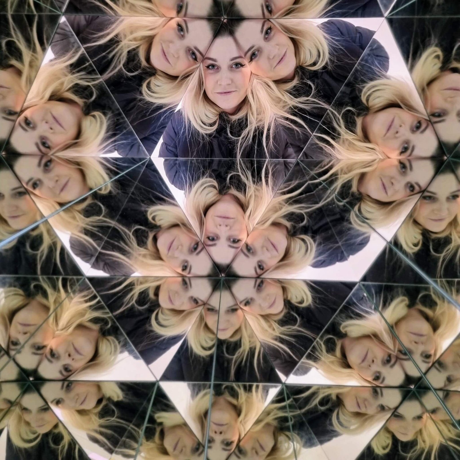 the author in a kaleidoscope illusion