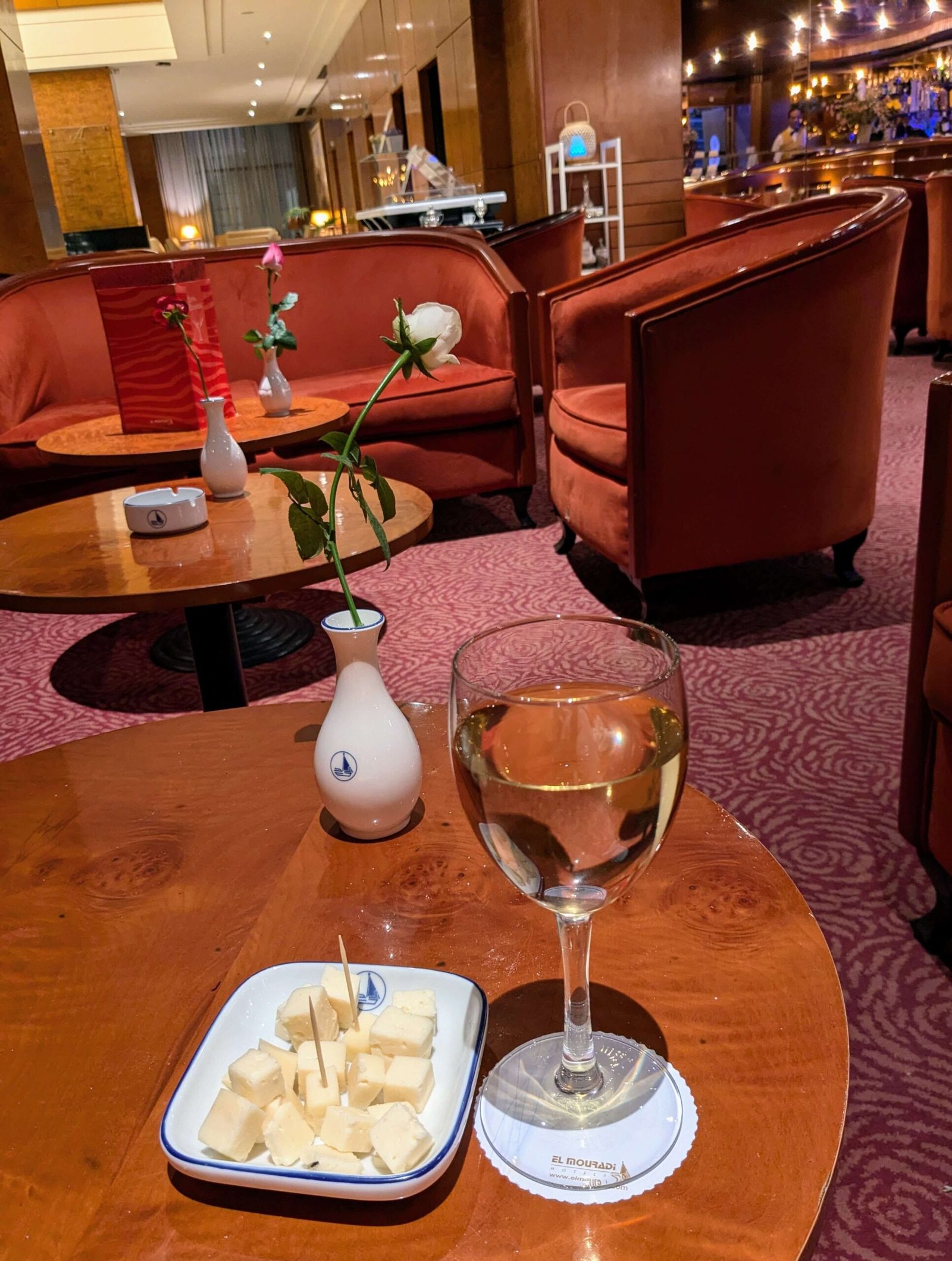 a glass of wine in the lobby bar at hotel africa