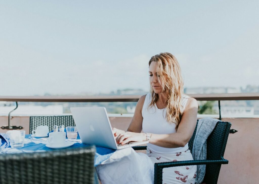 a woman working on a laptop