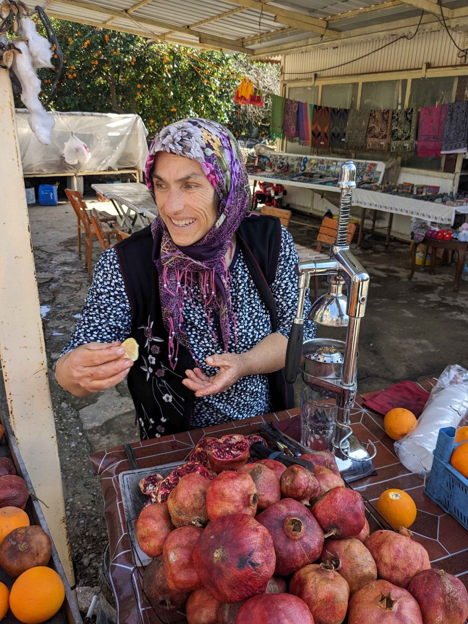 a turkish woman selling pomegranate juice