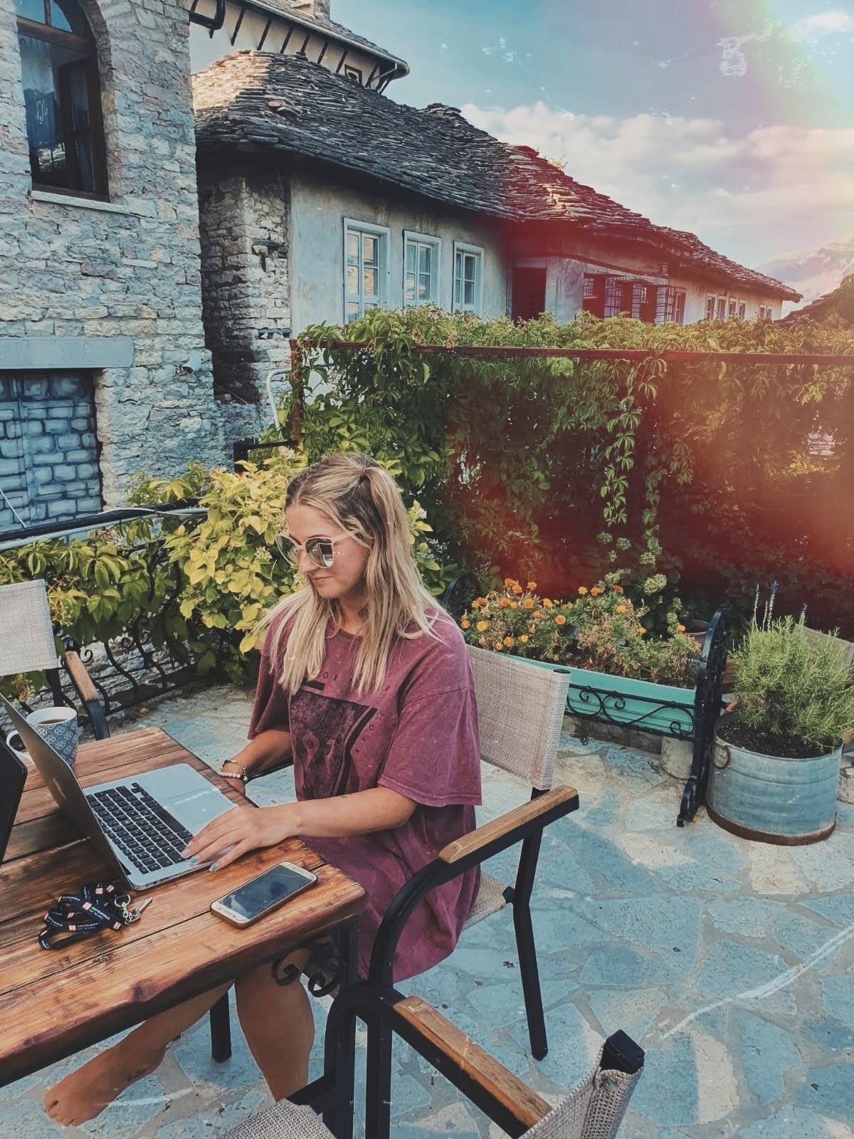 dani on her laptop in albania